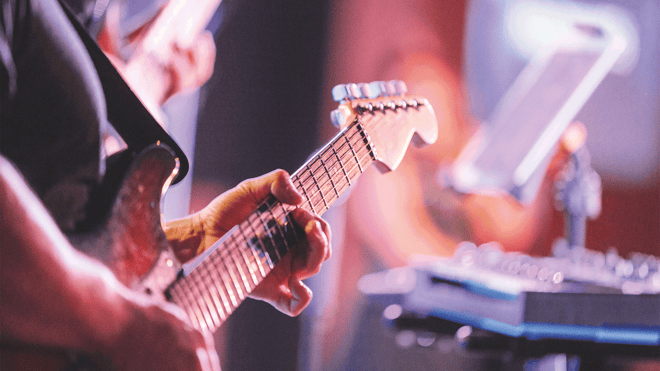 Man playing the electric guitar 