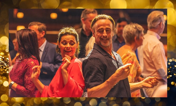 Mick and Angie find their groove on the dance floor as they enjoy live entertainment at a Warner Hotel